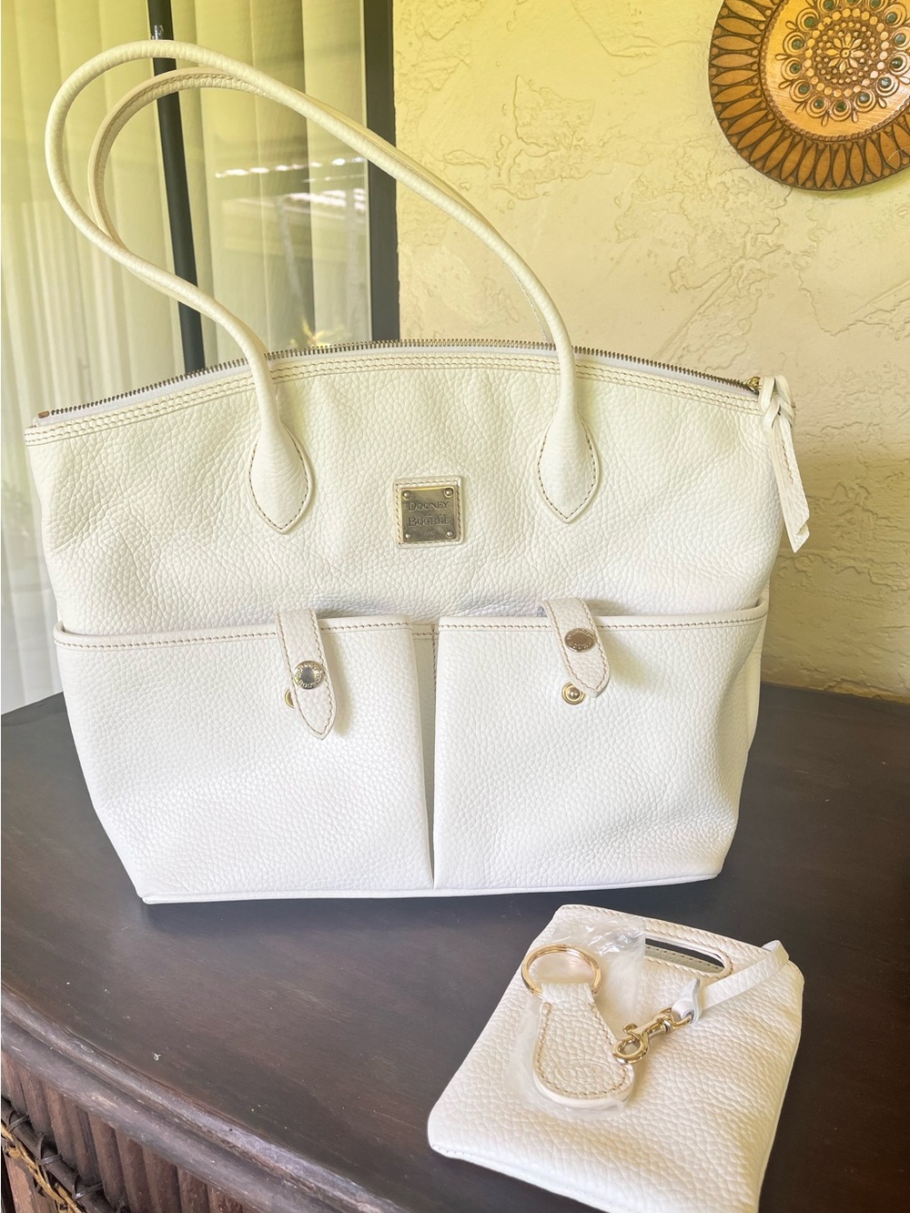 Dooney & Burke Vintage White Leather Crescent Tote Bag